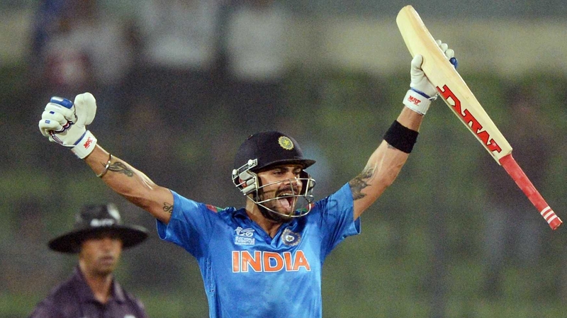 Virat Kohli celebrates after India eased to victory over Pakistan