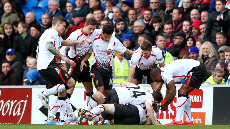 Martin Skrtel is mobbed after scoring Liverpool's third