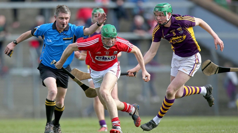 Cork's Seamus Harnedy pulls away from Liam Ryan of Wexford