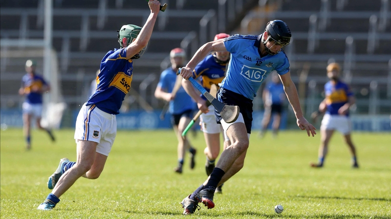 Tipp's Cathal Barrett goes in to disrupt Danny Sutcliffe's attempts to gain posession