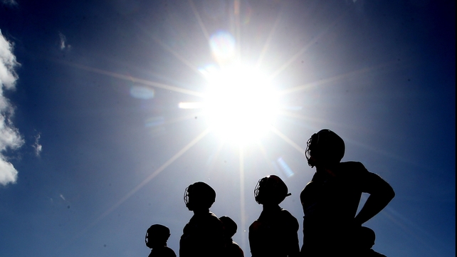'Shining lights': The Clare team stand for the national anthem