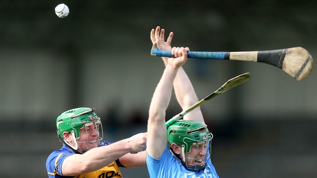 John O'Dwyer (left) challenges Johnny McCaffrey for the ball
