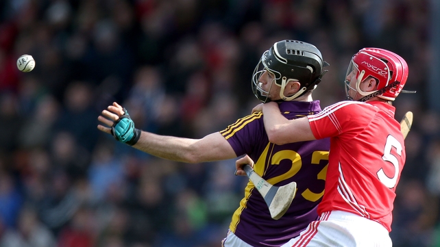 'Out of hand': Lorcan McLaughlin and PJ Nolan compete for the sliotar