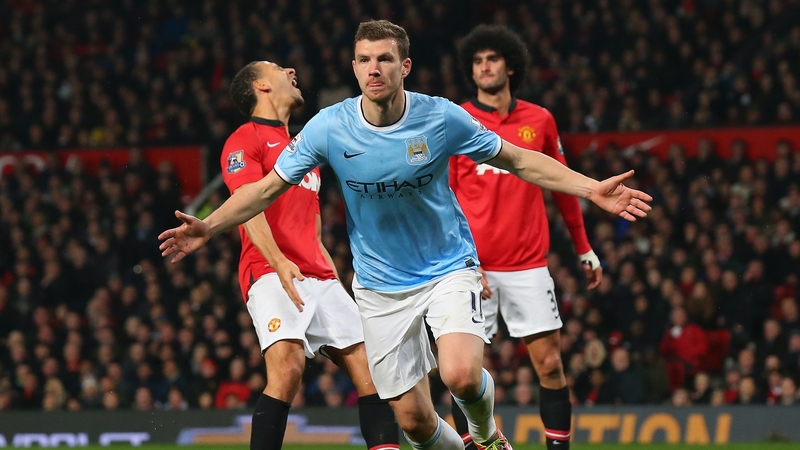 Edin Dzeko celebrates scoring Manchester City's second goal