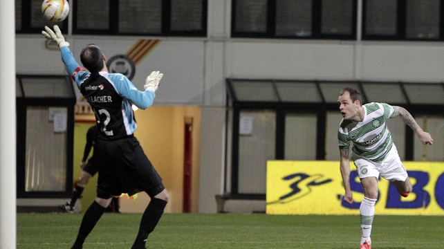 Anothony Stokes scores the opening goal as Celtic claimed a win at Partick that saw them claim the league title