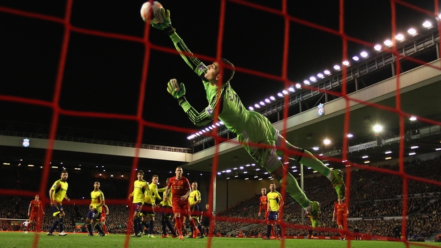 Vito Mannone of Sunderland is unable to stop Steven Gerrard of Liverpool scoring during the Reds' 2-1 Premier League win at Anfield