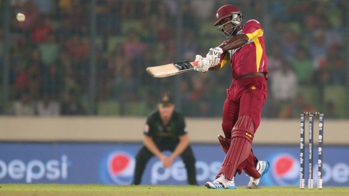 Darren Sammy of the West Indies hits a six in the final over