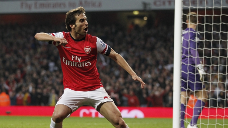 Arsenal's Mathieu Flamini celebrates scoring the equaliser