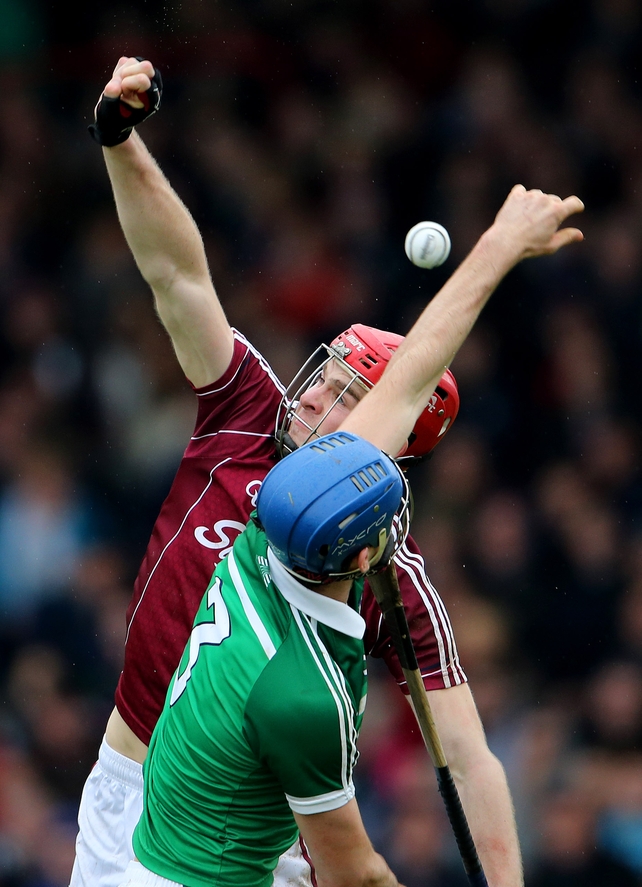 Philip O'Loughlin of Limerick and Jonathan Glynn Galway compete in the air