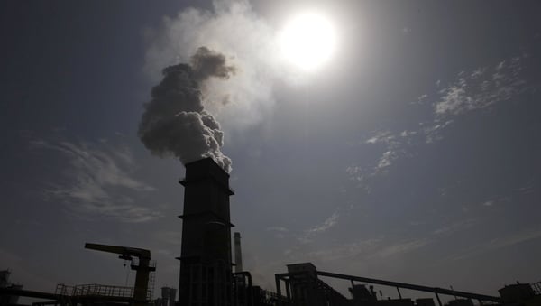 UN members have pledged to hammer out a global pact on global warming by the end of 2015