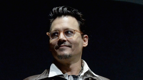 Depp: "The fact that I'm wearing a chick's ring on my finger is probably a dead giveaway"