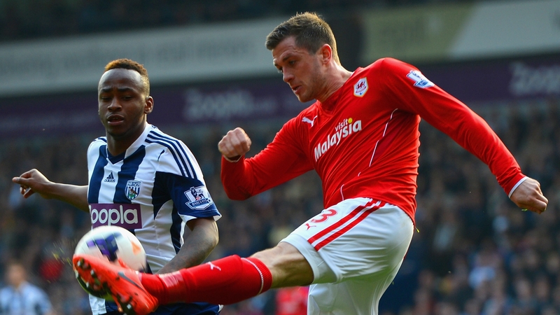 Saido Berahino challenges Cardiff's Andrew Taylor during the game