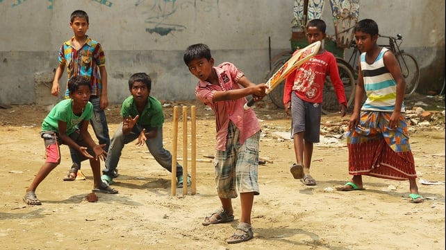 Local children play street cricket in the suburbs of Dhaka during the ICC World Twenty20 in Bangladesh