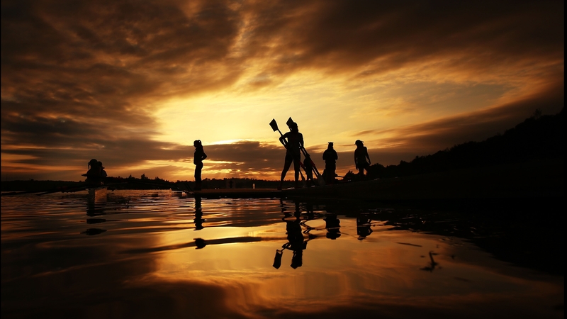 Crews head back from early morning training before the Rowing World Cup at the Sydney International Rowing Centre
