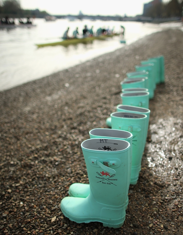 Cambridge crew boots on the shore during an outing on the River Thames ahead of the University Boat Race