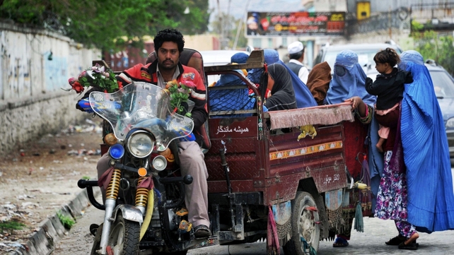 Women travel by rickshaw to cast their vote in Afghanistan