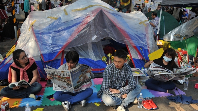 Student protesters outside the parliament building amid protests in Taipei over a contentious trade agreement with China in a bid to pressure the embattled government