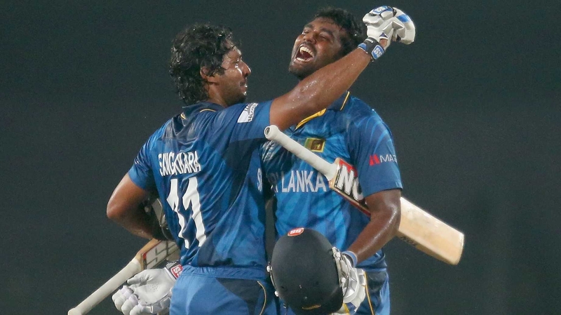 Kumar Sangakkara and Thisara Perera of Sri Lanka celebrate