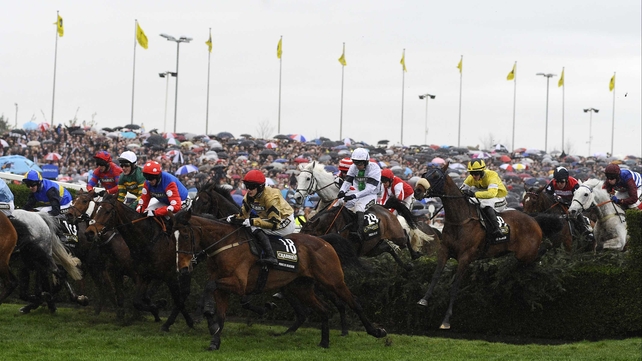 Horses and their riders jump The Chair