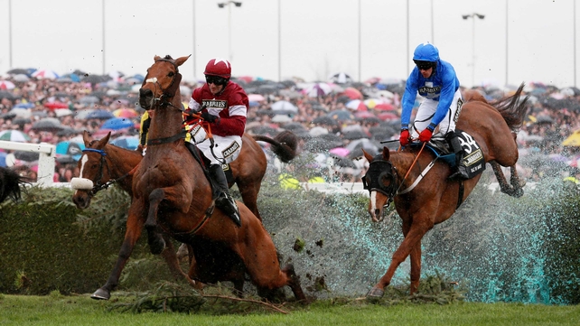 Quito De La Roque (centre) stumbles at the Water Jump