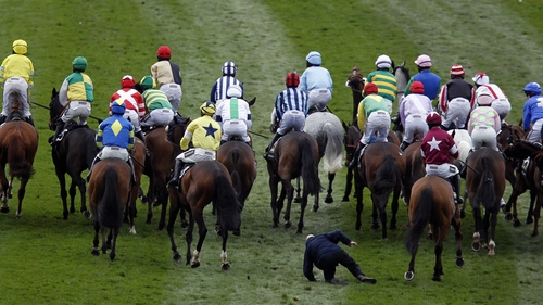 Simon McNeill was knocked over during yet another unsatisfactory start to the Grand National