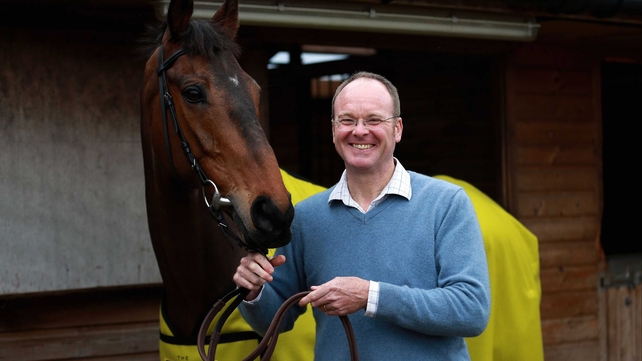 The morning after the night before - Grand National-winning trainer Dr Richard Newland casted a weary figure on Sunday morning while Pineau De Re was bright as a button