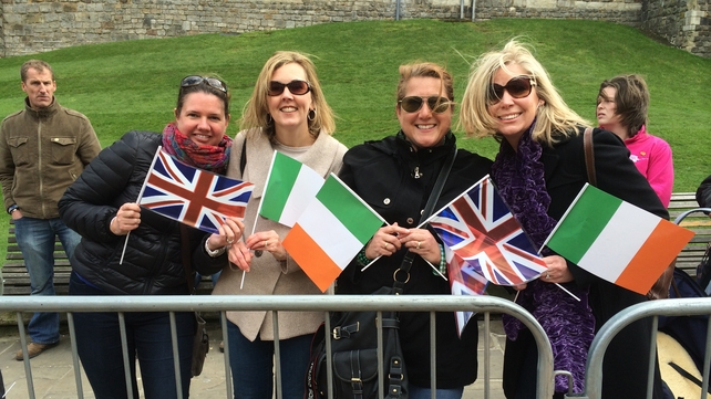 Tourists gather to view the royal procession in Windsor