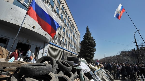 Pro-Russian activists block access to the Ukrainian Security Service building in Luhansk