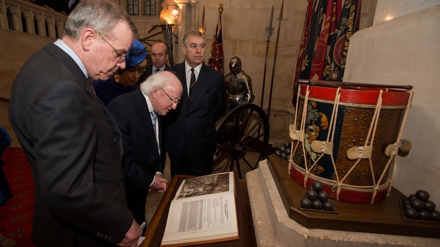 The President takes a keen interest as he views the Colours