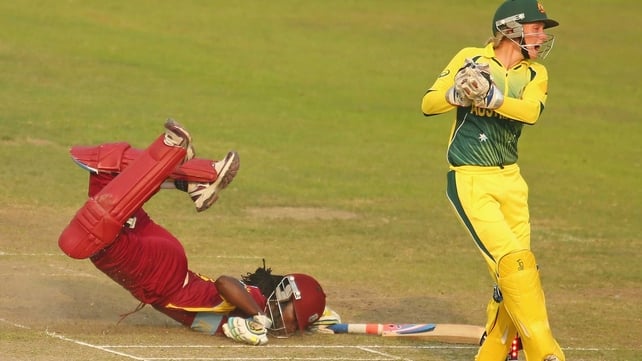 Stafanie Taylor of the West Indies dives but is run out by Alyssa Healy of Australia during the ICC Women's World Twenty20 in Bangladesh