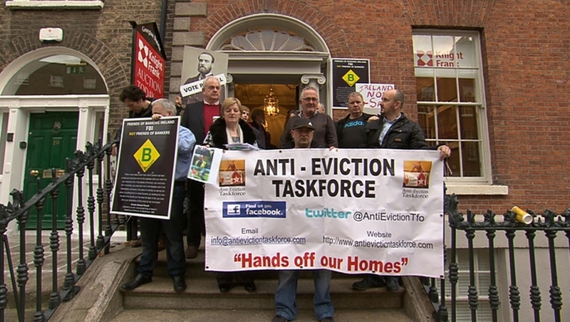 Protesters want a commitment from Knight Frank that it will not sell family homes that are the subject of a dispute