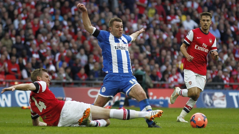 Callum McManaman (C) heading back to Premier League from Wigan