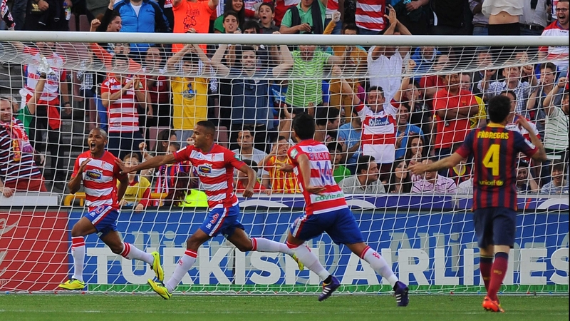 Yacine Brahimi (L) races away in celebration after his first half goal