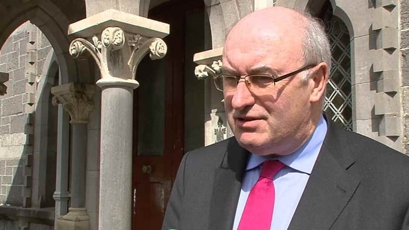 Phil Hogan said the country is obliged to meet legally-binding EU targets on reducing carbon