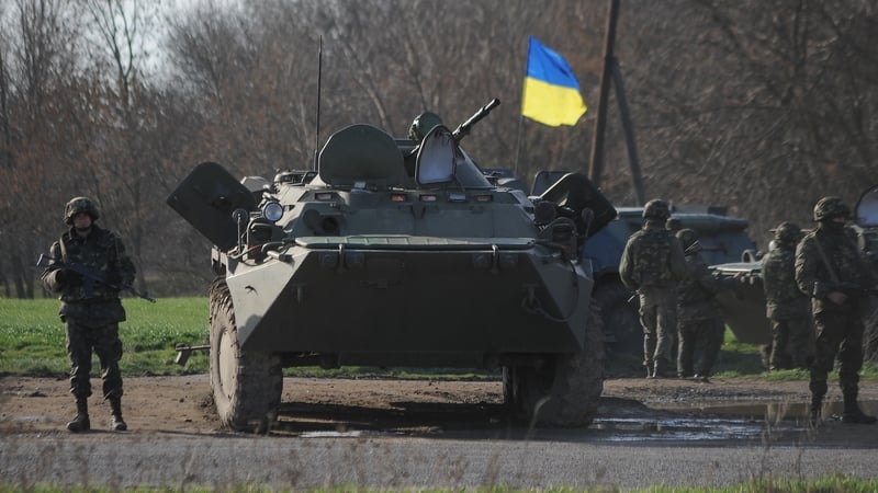 Military vehicles are seen on a road near the city of Kharkiv in eastern Ukraine (Pic: EPA)