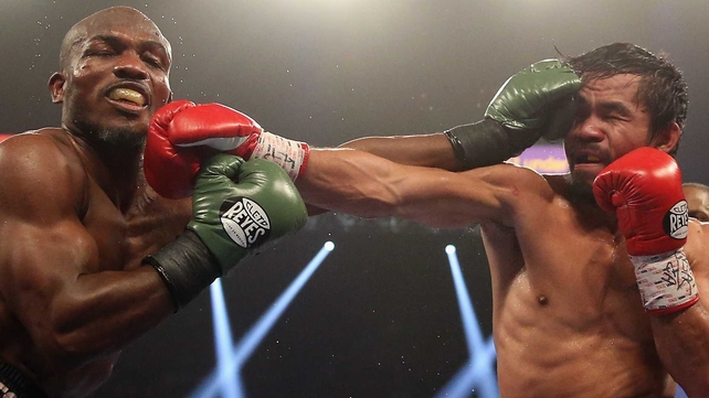 Timothy Bradley and Manny Pacquiao trade punches at the MGM Grand Garden Arena in Las Vegas