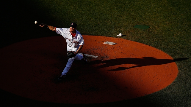 Jake Peavy pitches for the Boston Red Sox against the New York Yankees