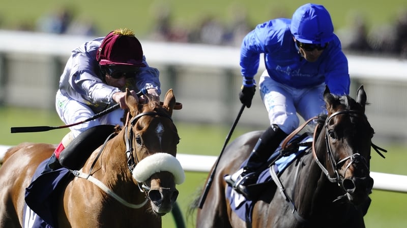 Frankie Dettori riding Sandiva (L) wins The Lanwades Stud Nell Gwyn Stakes