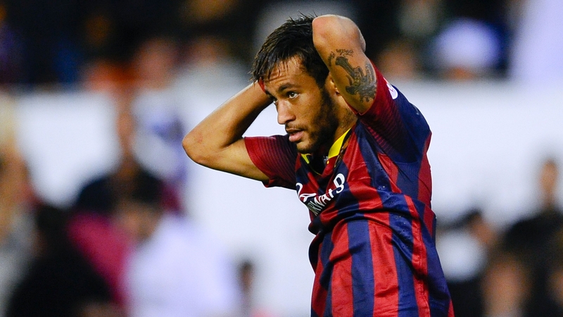 Neymar reacts after missing a chance to score during the Copa del Rey Final between Real Madrid and Barcelona