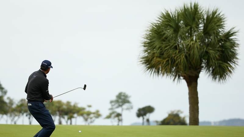 Matt Kuchar reacts to a missed putt on the 17th green