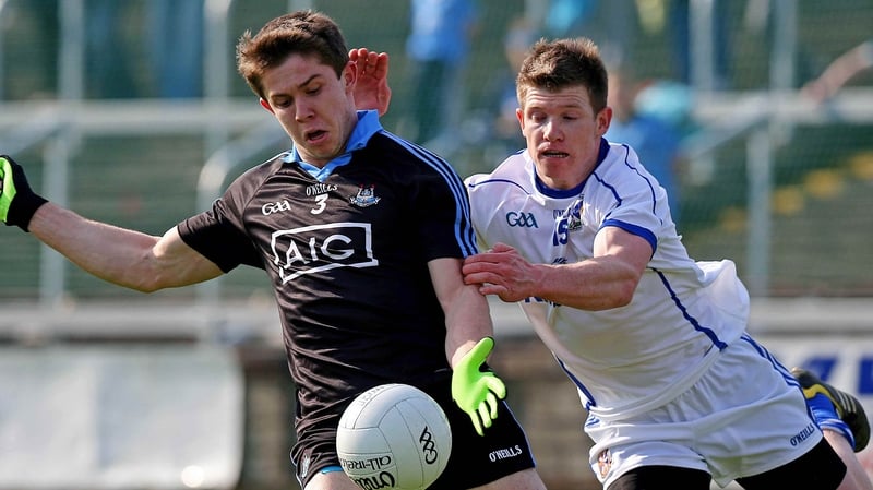 Dublin David Byrne evades a challenge from Joe Dillon of Cavan
