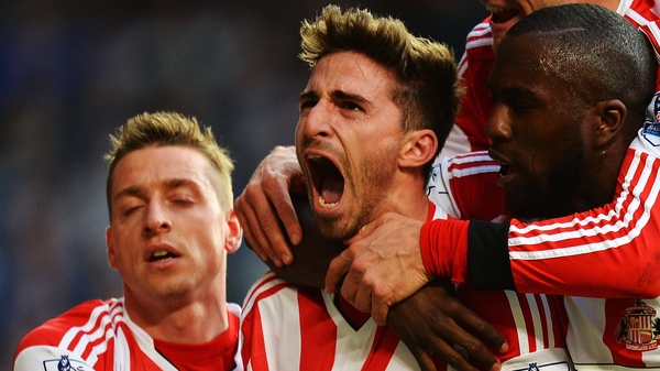 Fabio Borini (C) celebrates with team-mates after scoring his sides second goal from the penalty spot against Chelsea