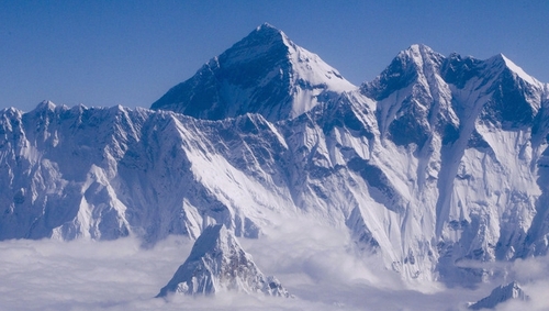 Dozens of guides were on the move when a huge block of ice broke off from a hanging glacier