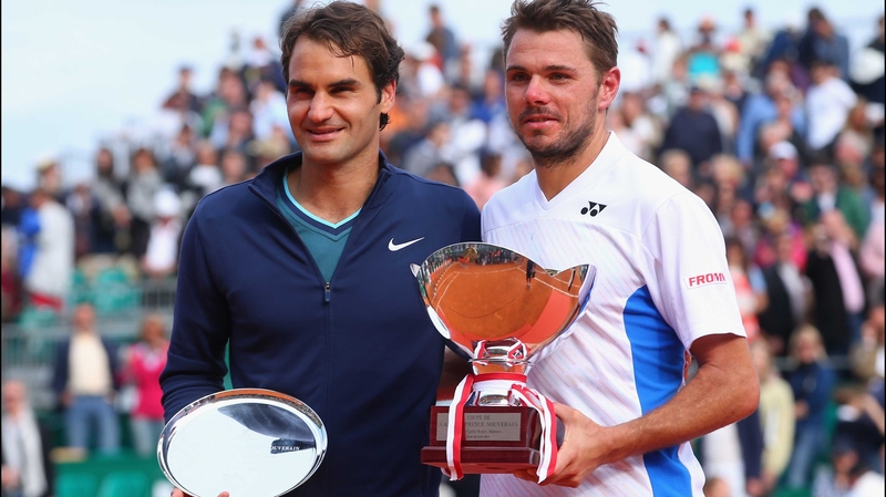 Winner Stanislas Wawrinka (R) alongside runner up Roger Federer