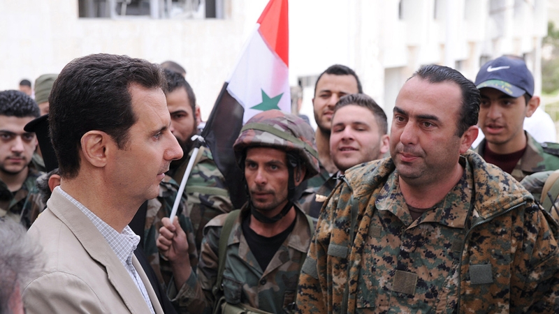 Syrian President Bashar al-Assad (left)