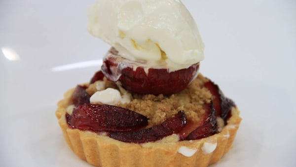 Glazed plum and frangipane tart with a roasted plu