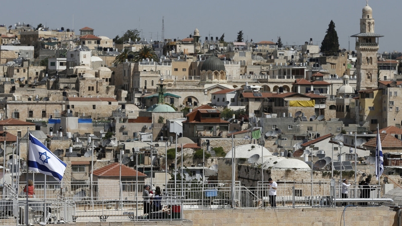 An Israeli flag flutters in Jerusalem's Old City
