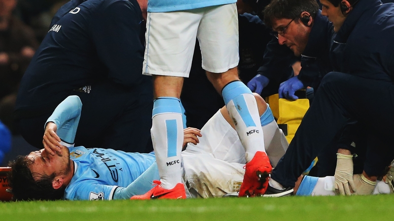 David Silva of Manchester City is given treatment during the match between Manchester City and West Bromwich Albion