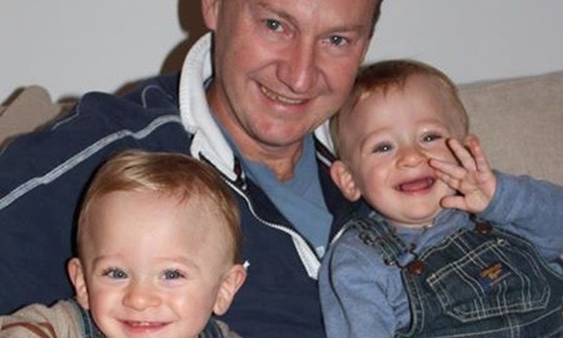 The twins pictured with their father Gary Clarence