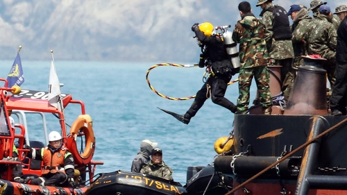 Search conditions inside the ferry are still challenging (Pic: EPA)